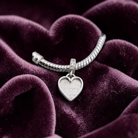 HEARTSTRING CHARM